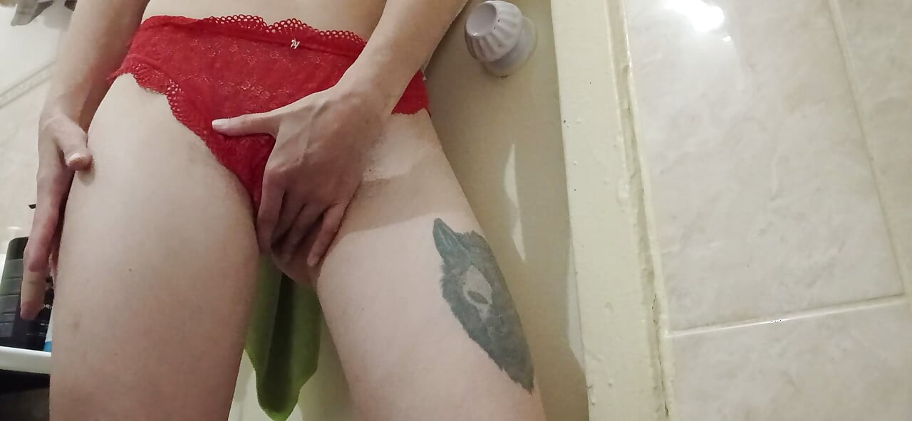 A skinny student girl in red panties masturbates her hairy pussy