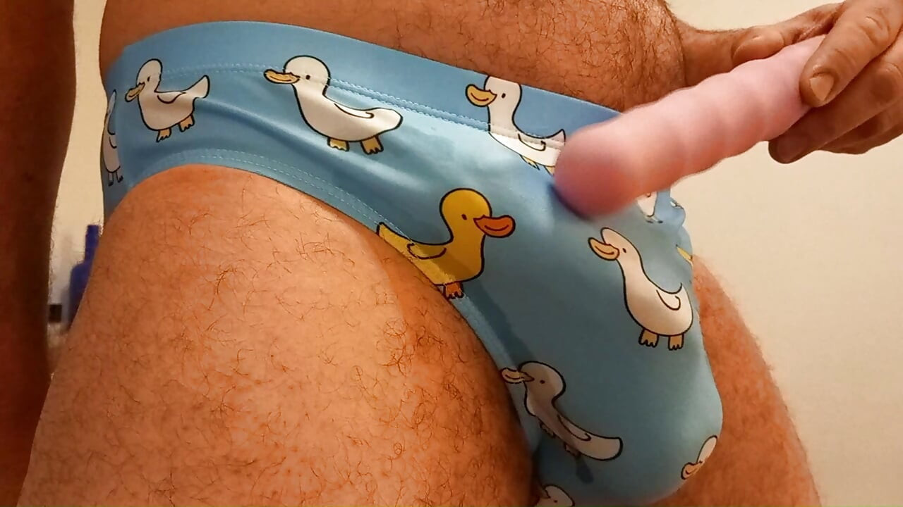 Speedo cum. Rubbing, vibrating, masturbating small penis bulge in speedo, swim trunks, brief. Please humiliate in the comments.