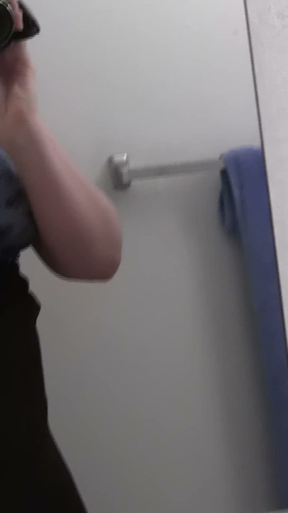 Busty Redhead in Glasses Films Herself Naked in the Bathroom Mirror