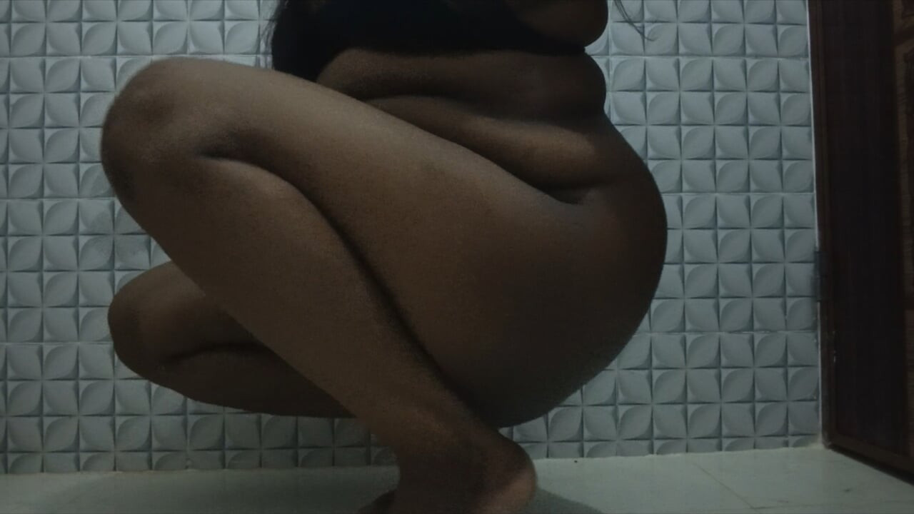 Cute desi girl slowly undressing in bathroom