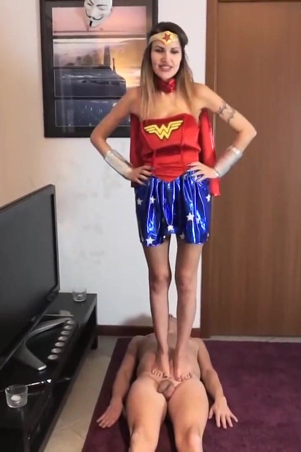 Costume woman standing on her slave