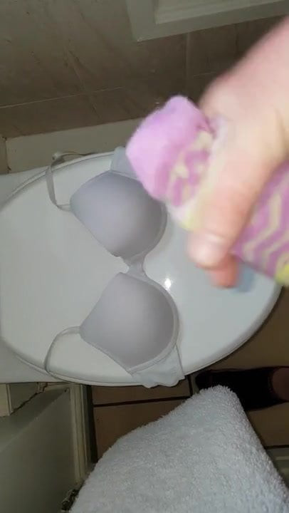 Sock handjob cum on bra
