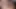 Ateşli hatun kanepede yatarken dildoyla sikişiyor