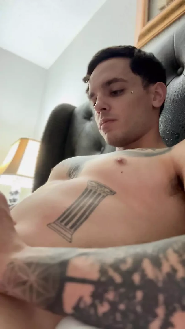 Adult starts to insert piercing into hole and pre