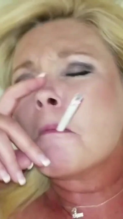 Stunning moment from "Horny Cumslut Fucks While She Smokes"