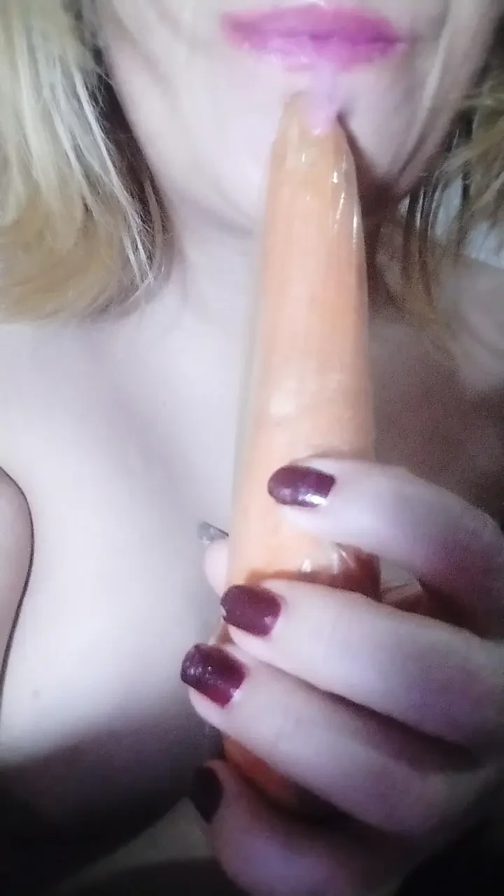 Staife the plays with her breasts