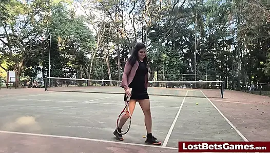 An outdoor strip tennis match with Rafaela and Igor