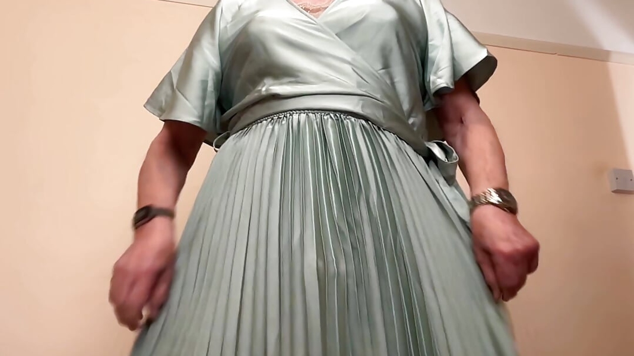 Enjoying wearing my pleated dress.