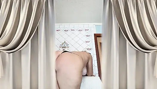 Hot Housewife Lukerya in the Kitchen in Black