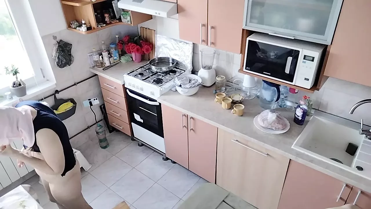 Hot amateur couple having fun in the kitchen.