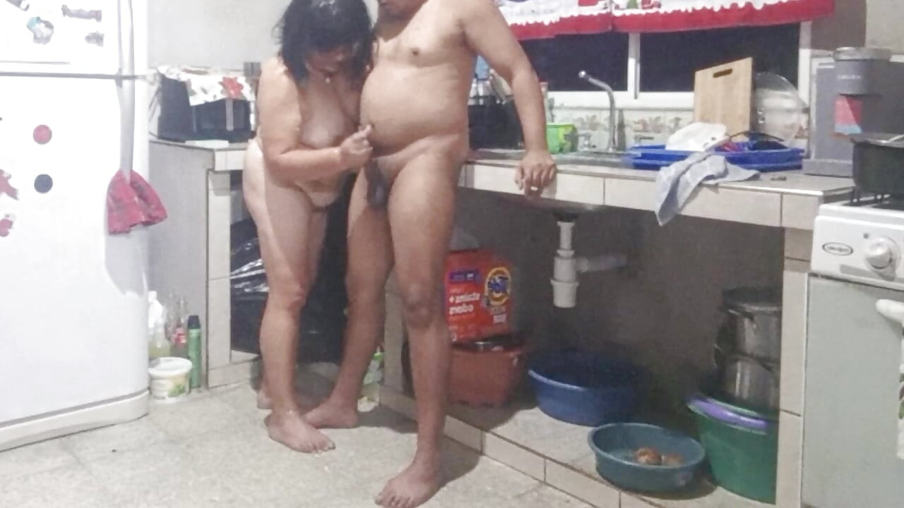 My mother-in-law masturbates me in the kitchen and wants me to fuck her doggy style.