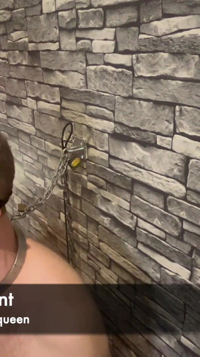 Iconic moment from "Femdom mistress punishes chastity slave leaves him chained to the wall naked"