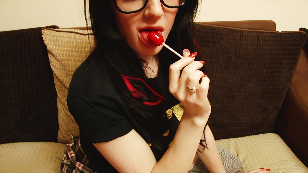 Stunning Brunette Bombshell Batman Samantha Bentley Likes Tu Rub Her Pussy Licking Lollypop