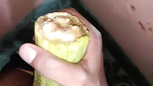 An Indian boy made a hole in a cucumber and inserted his penis inside it and masturbated.