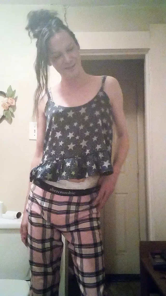 millie wets diaper and puts pajamas back on