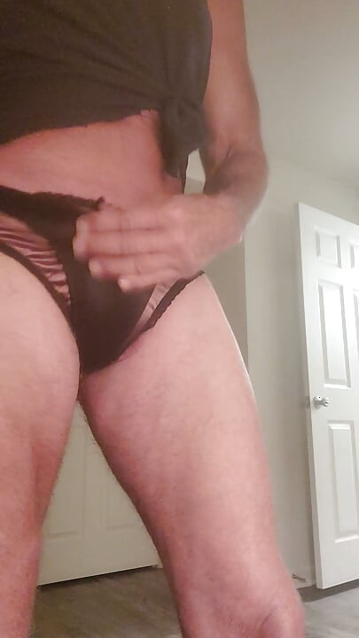 Masterbating in sexy satin thongs.