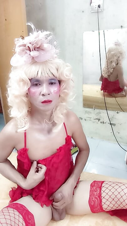 Oanh Le transgender wearing suggestive clothes to play with cans pretending to be too happy