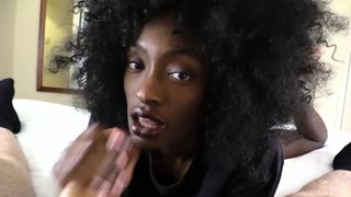 Ebony stroking cock