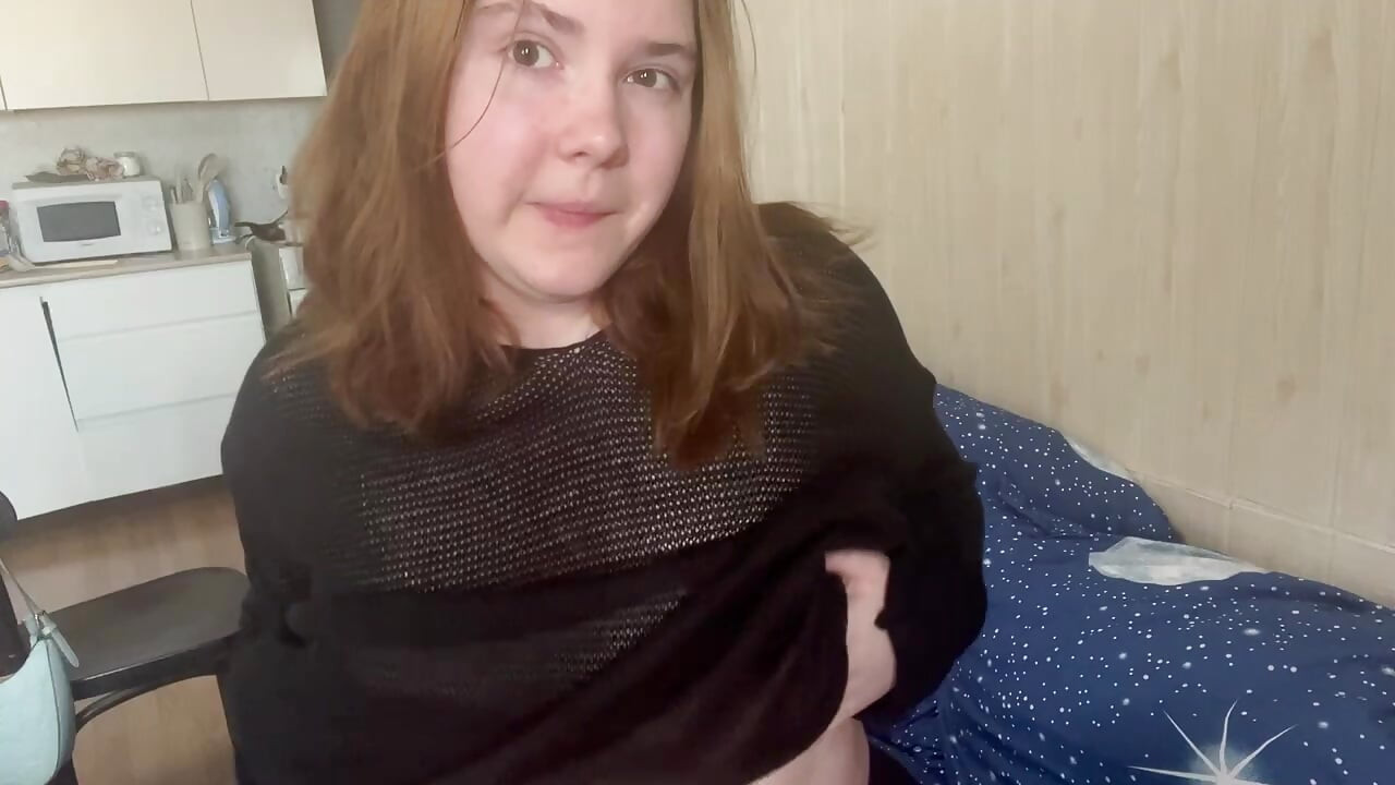 Daphne Key is fooling around on camera with a vibrator, pleasuring herself.