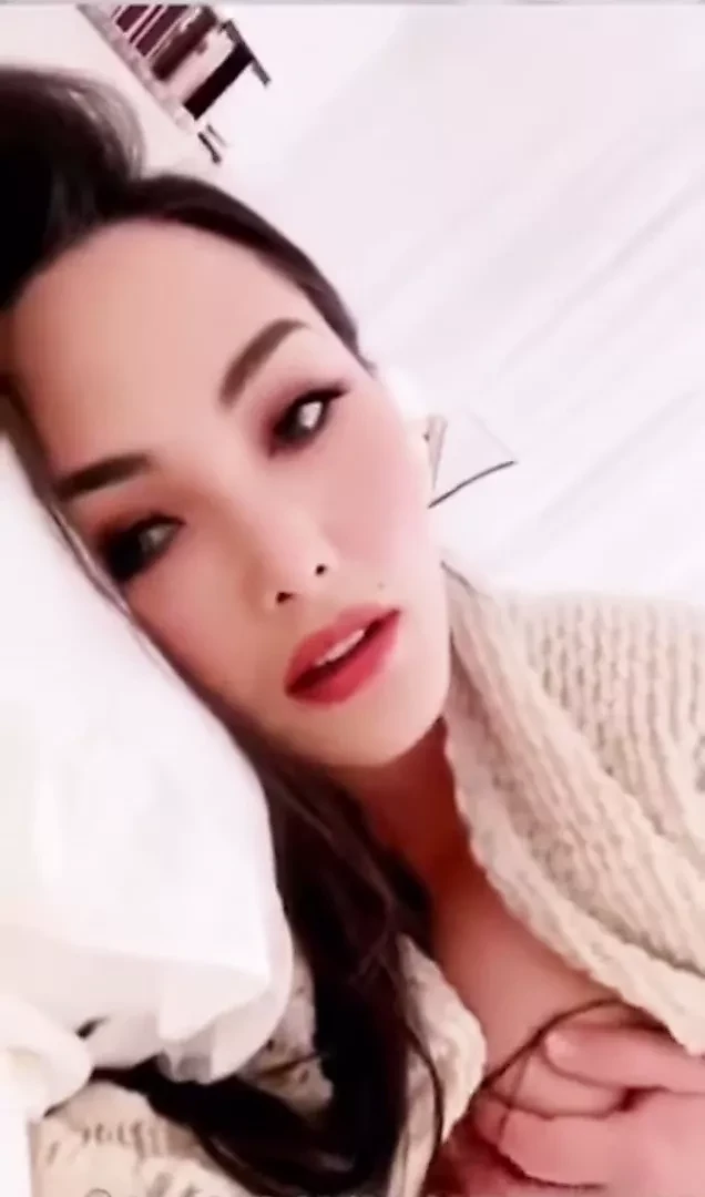 Yasmi Pajyi Yang caressing and squeezing her boobs