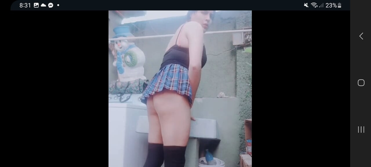 effeminate sissy smoking dressed as a slutty schoolgirl