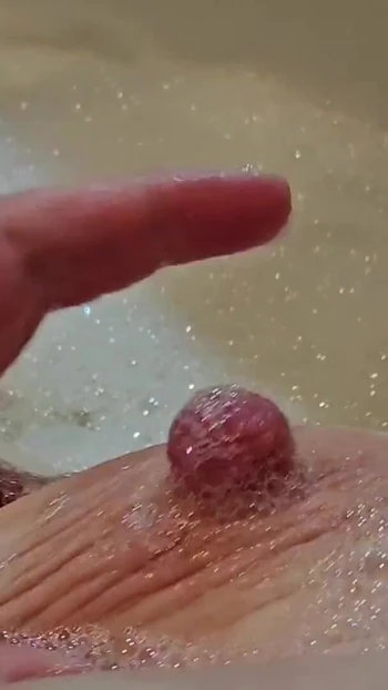 Stunning moment from "Sensual BBW Bath with Nipple and Belly Play"