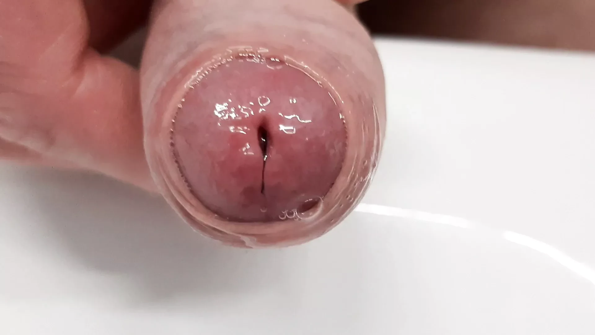 Cumshot close up - wet foreskin