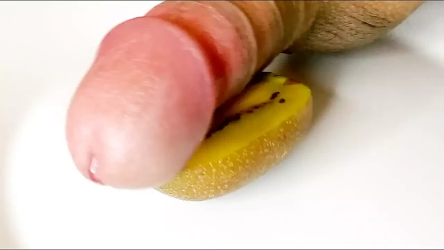 Smooth sliding on a lush wet Kiwi makes precum sweet and green on closeup