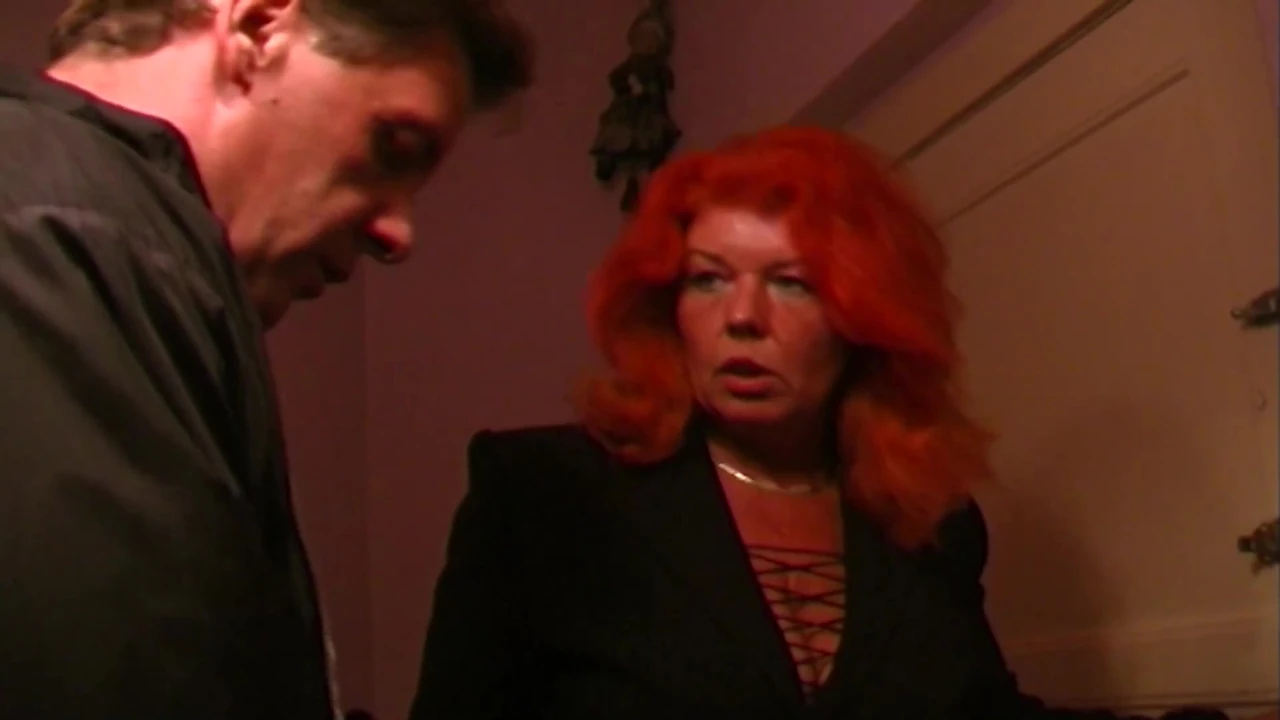 A horny German granny with red hair gets her pussy sprayed