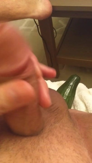 Masturbation with cucumber