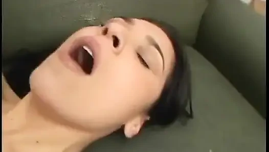 Long haired latina takes DP on green couch then gets her face jizzed