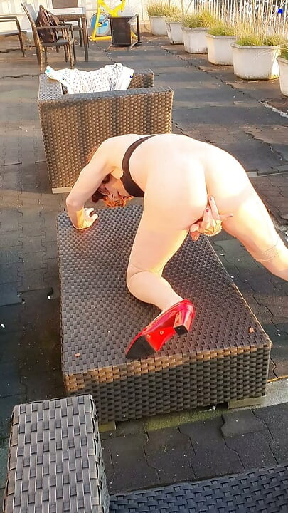 Naked on the roof terrace