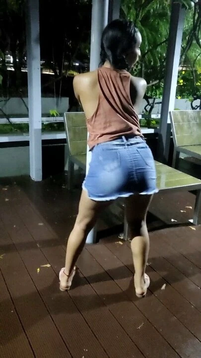Latina sucks her best friend's cock in public