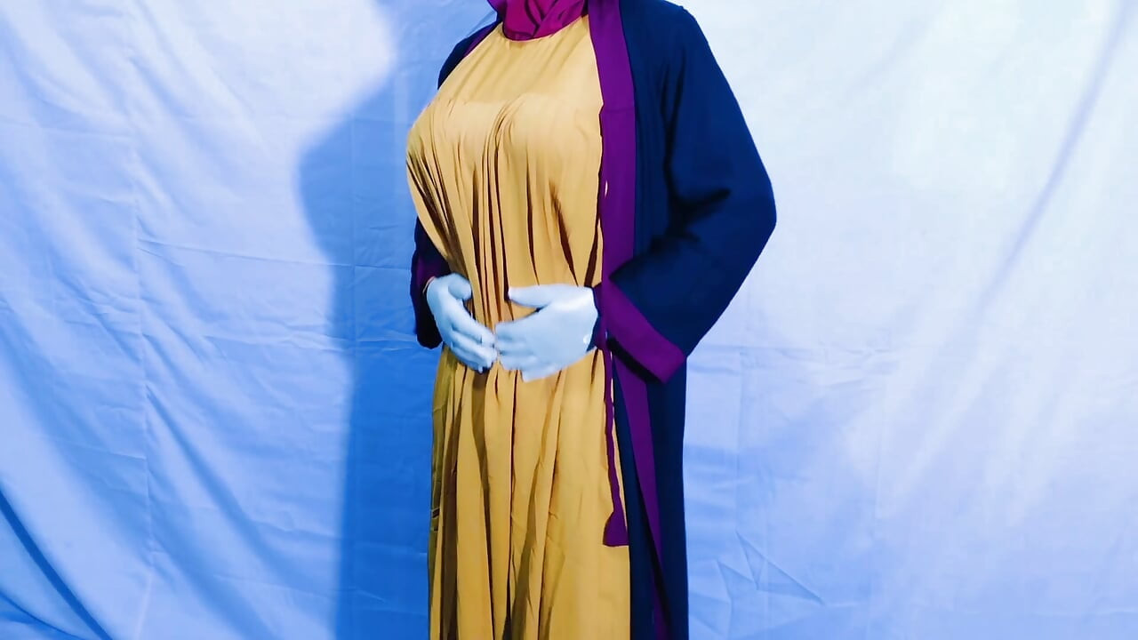 A very beautiful Indian woman wearing a hijab is spending the night with a man who is not her husband.