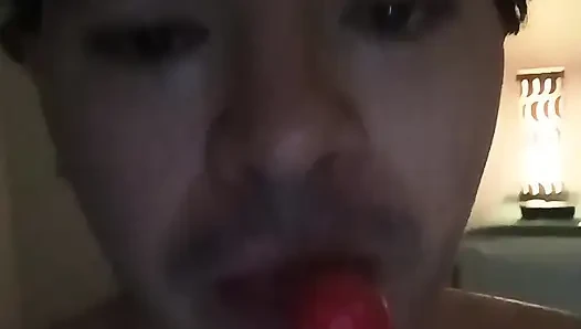 gay femboy sexy skirt lingerie and licking lollipop