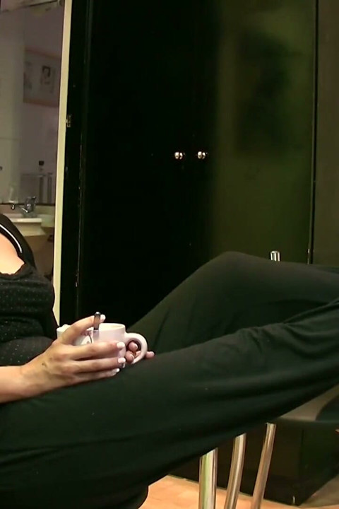 Hot looking MILF riding cock in the living room