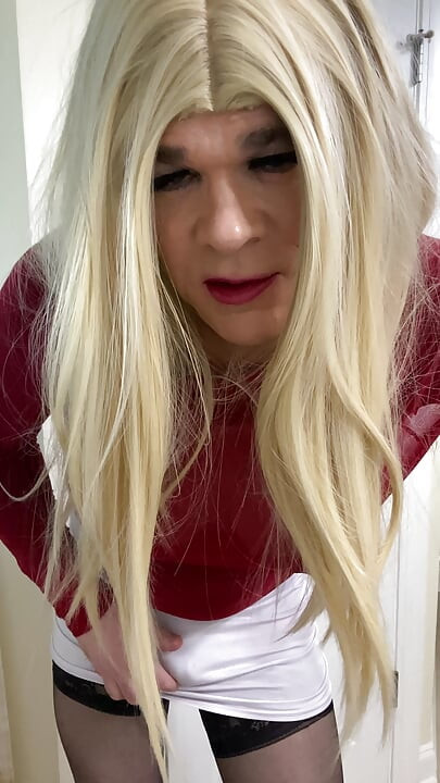 MILF Crossdresser in black thigh high stockings and heels talks fetish talk while wearing a pussy over her cock like a shemale