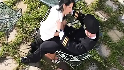 Randy pilot fondles sexy brunette in the cockpit