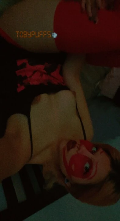 Very horny XsySexyBaby chick in red makeup puts butt plug up her ass while she plays with her clit with a dildo