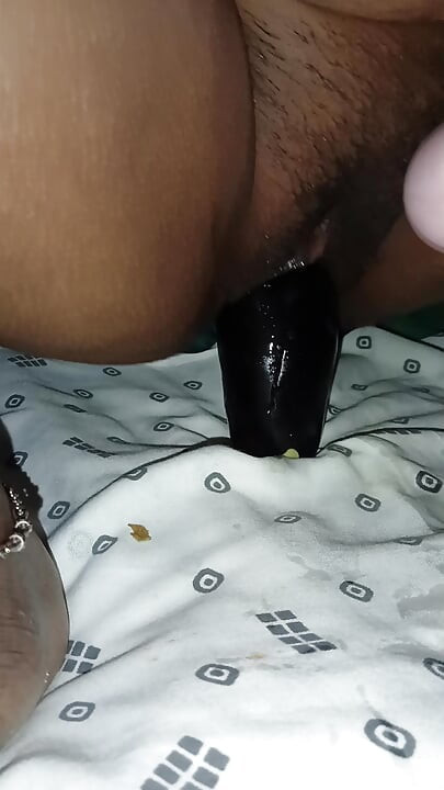 Sister-in-law masturbating with huge eggplant