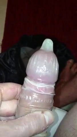 Condom filled with huge load