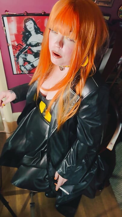 The Gothic Cutie Tina Snua Dressed In a Leather Coat & Smoking A Cork 100 Cigarette - Ginger Miss Smokes In A Leather Outfit OME