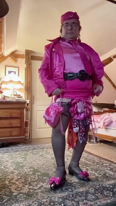 Dressed in a fuchsia miniskirt for her flight attendant party