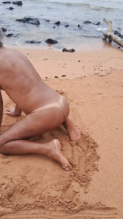 Ladysilva on the beach naked showing off her big sexy ass tanned with mark