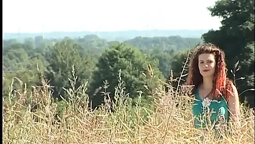 Busty redhead teen lifting dress outdoors