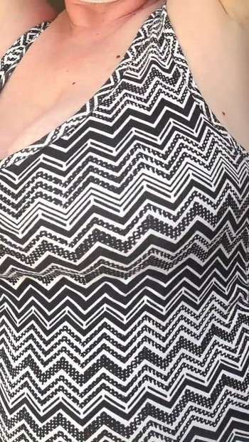 Thrilling moment from "Big gorgeous tits in a tight T-shirt with a deep neckline close-up."