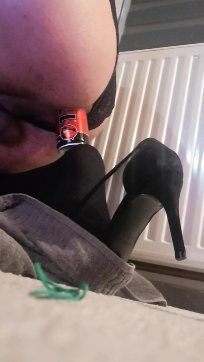 Can of energy drink in my ass