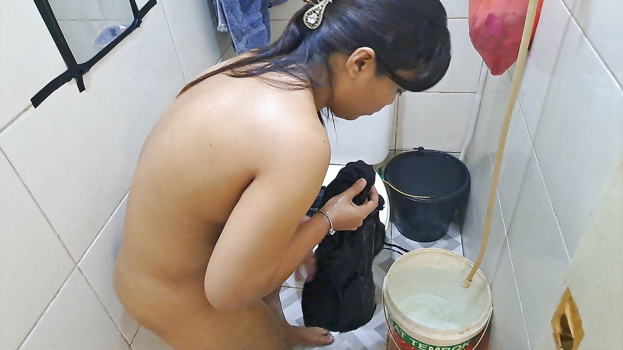 My wife is washing her clothes.