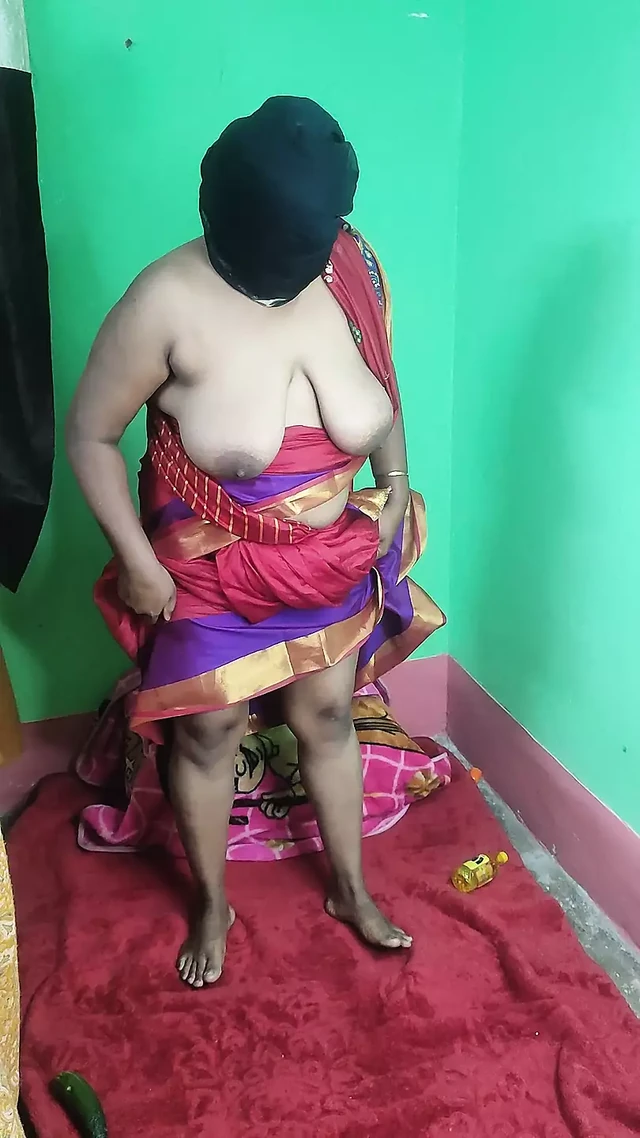 Desi Bengali boudi Strips in sharee and fucking with cucumber