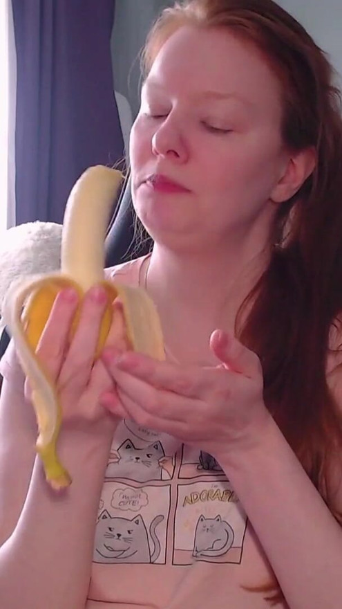 It's time for a sweet snack! This banana looks soooo much like your dick! Look how greedily I suck it! | Clip 1
